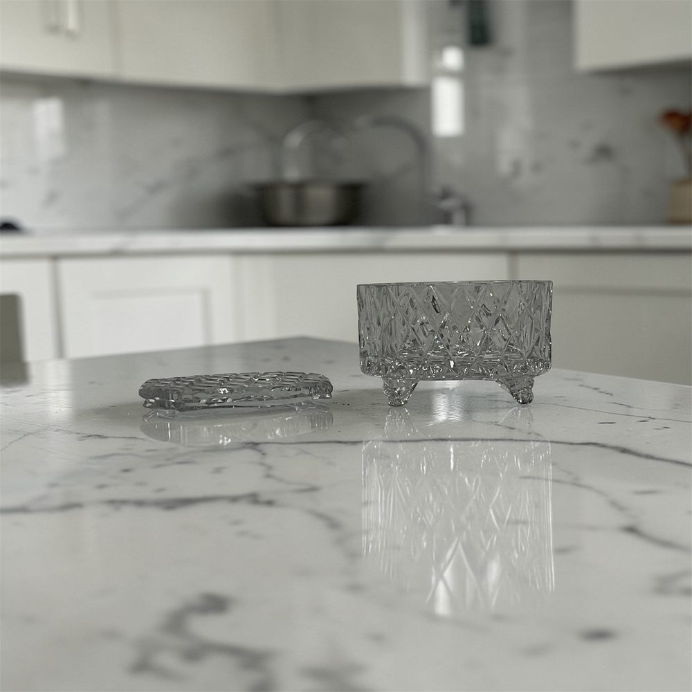 Cut glass canister on a marble kitchen bench
